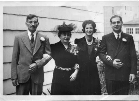 A group of people posing for a photo

Description automatically generated