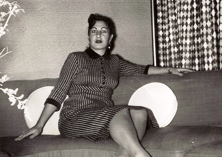 A person sitting on a couch

Description automatically generated