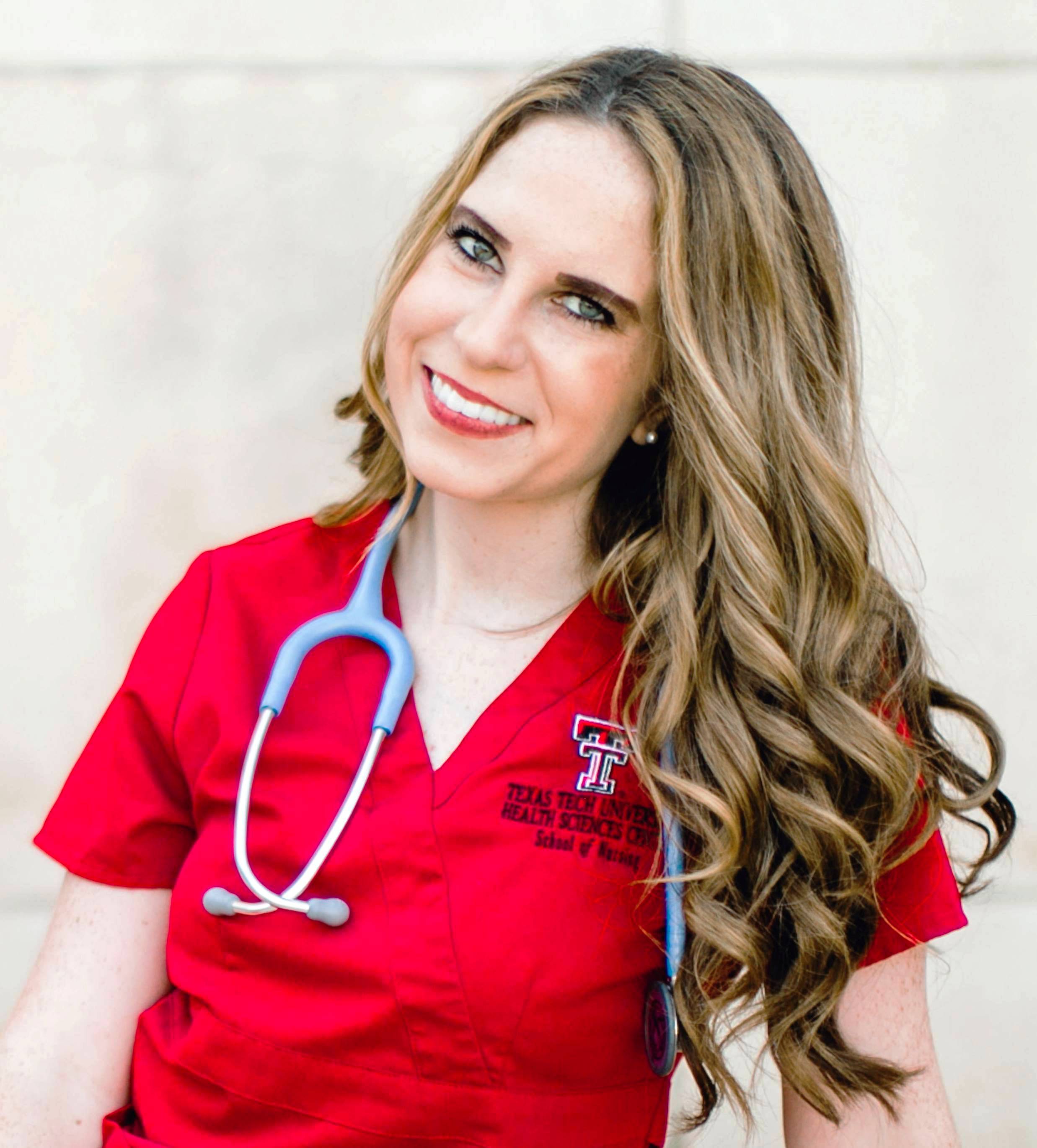 A person wearing a red scrubs

Description automatically generated