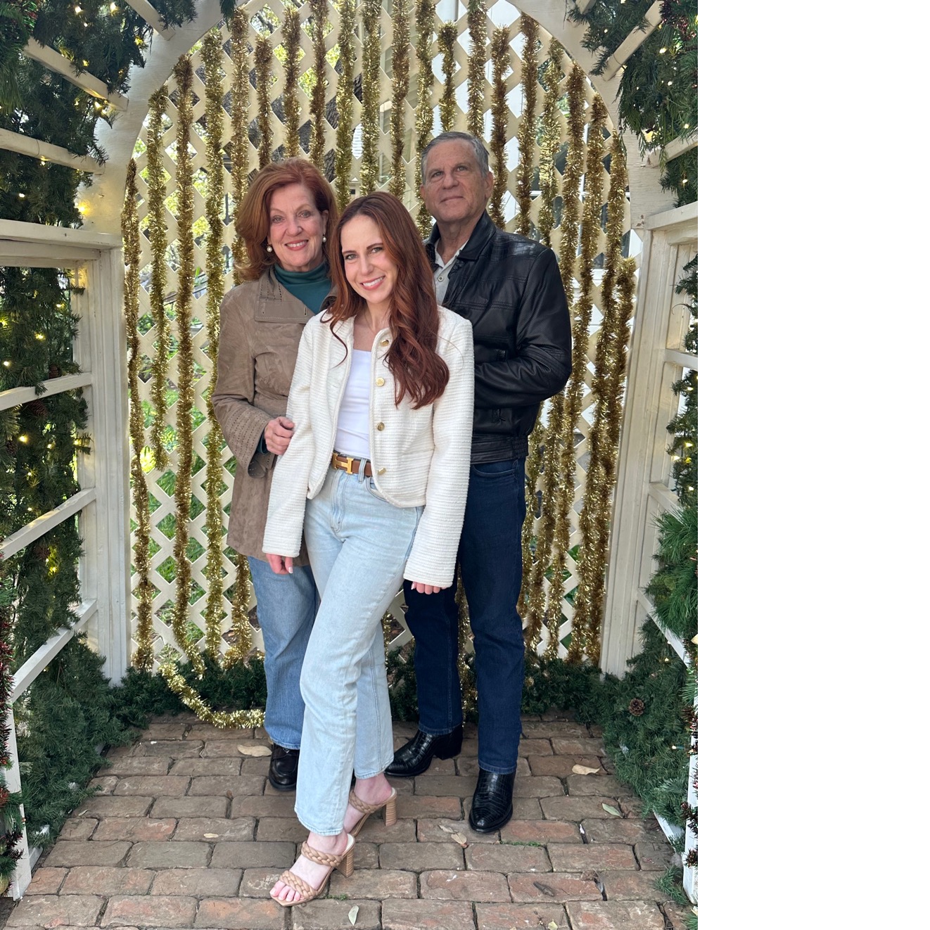 A group of people posing for a picture
Description automatically generated