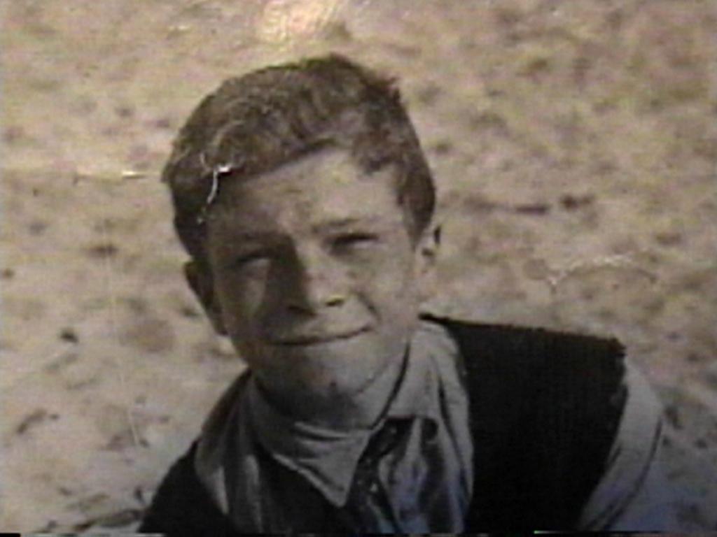A child smiling for the camera

Description automatically generated