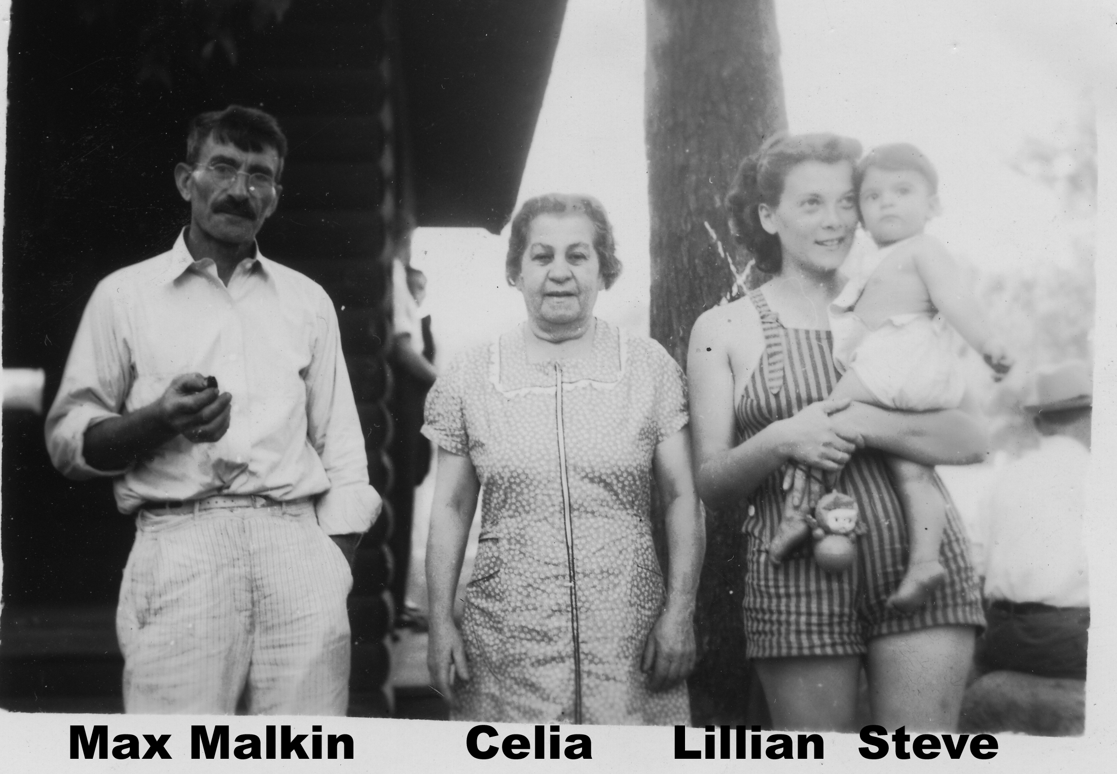 A group of people standing outside

Description automatically generated