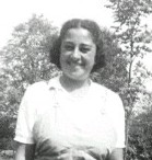 A person smiling for the camera

Description automatically generated