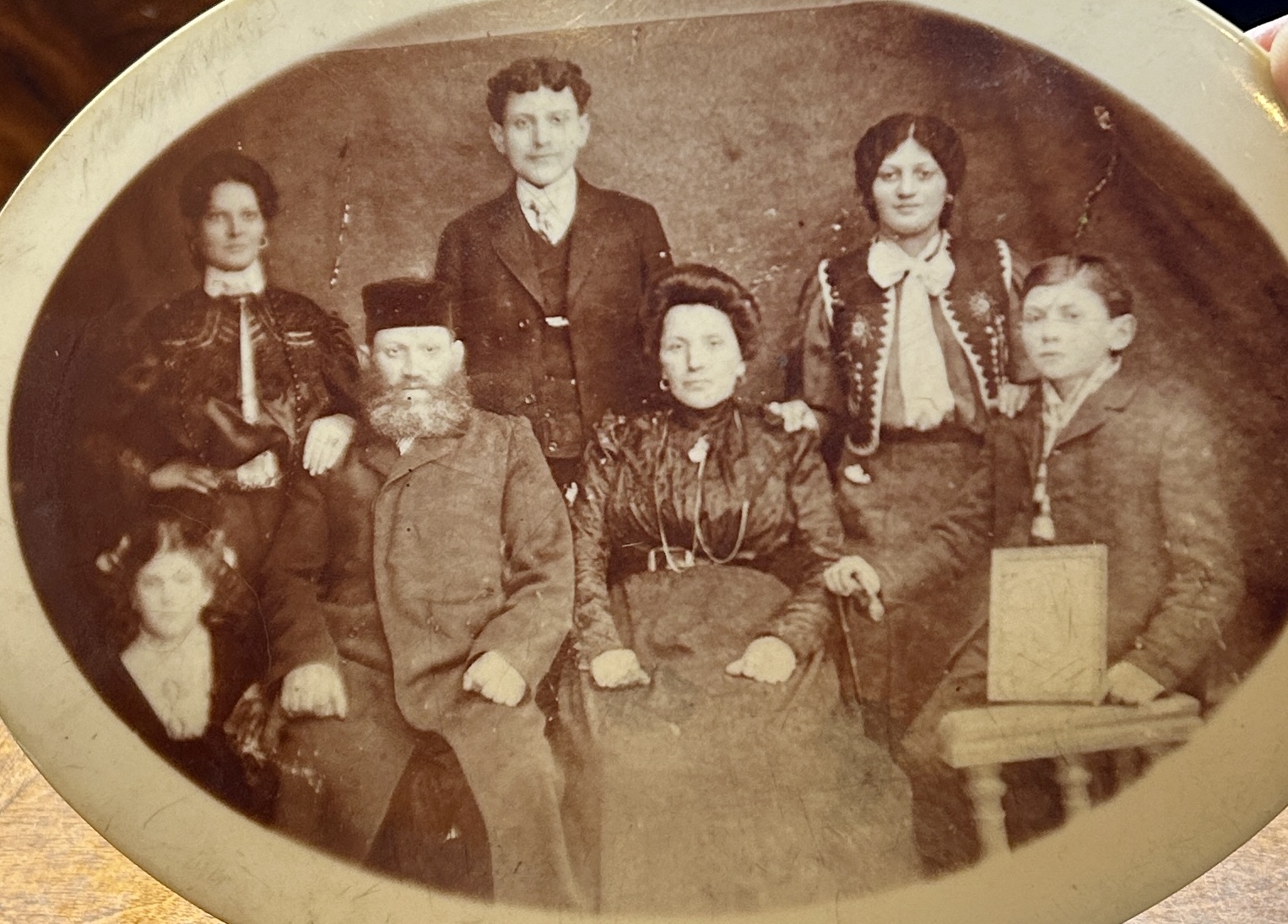 A group of people posing for a photo

Description automatically generated