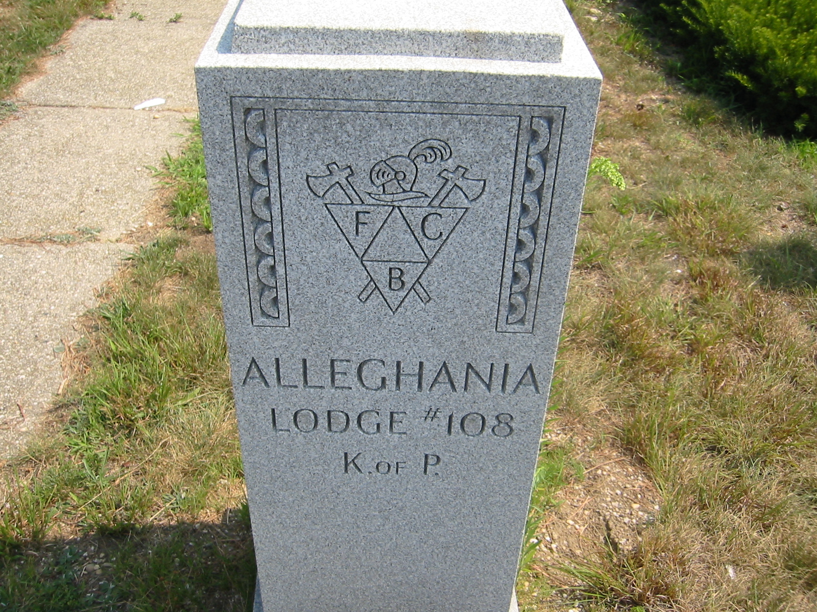A stone monument with engraved letters

Description automatically generated with medium confidence