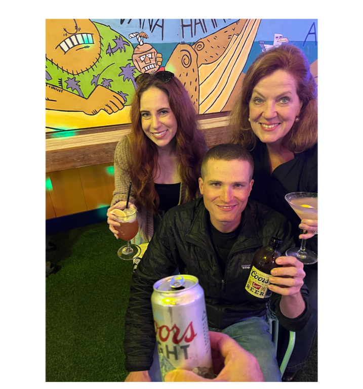 A group of people posing for a photo
Description automatically generated